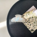 Detail of pearlescent white acrylic claw clip on a tray with floral card decoration - 8cm Square Head Claw Clip / Iridescent Rice Beads