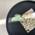 Detail view of large light green pearlescent acrylic shark hair claw clip with colorful sheen - 8cm Square Head Claw Clip / Iridescent Green