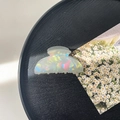Macro shot of large crescent hair claw with iridescent pearlescent finish and shell texture - 8cm Square Head Claw Clip / Phantom Grey