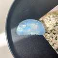 Macro view of light blue acrylic hair claw clip with iridescent shell texture detail - 8cm Round Head Claw Clip / Fantasy Blue