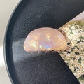 Detailed macro view of the pink pearlescent acrylic hair claw clip with shell luster finish - 8cm Round Head Claw Clip / Phantom Orange