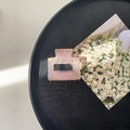 Detail view of pink acrylic rectangle hair claw clip with pearlescent finish on wood tray - 5cm Square Claw Clip / Phantom Orange