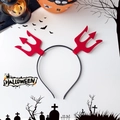 Detail view of a Halloween devil trident headband with red glitter elements on a black band - Red Fork Style