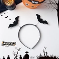 Detail of Halloween headband with bouncing felt bats on springs over white background - Bat Spring Style