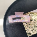Iridescent pink rectangular hair claw clip detail on a black textured tray - 10.5cm Rectangle Claw Clip / Phantom Purple