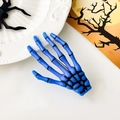 Détail de la pince à cheveux main de squelette bleue pour fête d'Halloween gothique - Bleu saphir