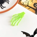 Pince à cheveux main de squelette vert néon pour Halloween sur fond blanc thématique - Vert Néon