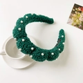 Detail of dark green bouclé headband with white pearls and premium soft plush texture - Teddy Plush With Pearls / Green