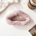 Close-up of fluffy pink plush hair claw clip on a cozy white aesthetic background - Pink