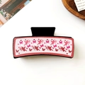 Detail view of rectangular hair claw clip with pink angel and heart pattern motifs - Cupid Butterfly Black (2#10.5cm Square Clip)