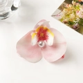 Detailed view of realistic pink and white gradient orchid hair clip with central pearl accent - Pink White