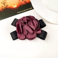 Detail view of burgundy fabric rose hair claw with elegant black ribbon bow accessory - Fabric / Burgundy Duckbill Clip