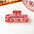 Detail of red floral print on checkered hair claw clip with a glossy acetate finish - 10.5cm Square / Plaid Floral Red