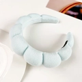 Detail of light blue padded cloud headband with soft textured sponge fabric surface - Light Blue