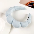 Detail of light blue puffy cloud headband made of soft terry cloth material - Sky Blue