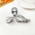 Detail of holographic bow hair claw clip showing shiny iridescent finish and metal spring - 13cm Iridescent Bow (Blue Gray)