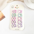 Détail de 10 barrettes à cheveux colorées à motif écossais sur carte de présentation - Ours