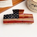 Close-up of high-gloss American flag pattern on a durable acrylic hair claw clip - Rustic Vintage Flag Solid Square Clip (10.5)