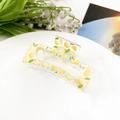 Detail shot of rectangular lemon print hair claw clip on a decorative white porcelain plate - Fruit Lemon (8.5cm Square)
