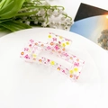 Close-up of floral butterfly print on clear acrylic rectangular hair claw clip for women - Butterfly Flower (8.5cm Square)