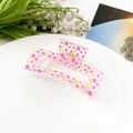 Close-up of pink floral hair claw clip on white tray with lily of the valley - Pink Floral (8.5cm Square)