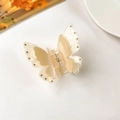 Elegant cream butterfly hair claw clip with rhinestones and pearlescent finish - Orange