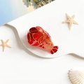 Gros plan détaillé d'une pince à cheveux homard en acétate avec dégradé orange - Homard Rouge (4cm)