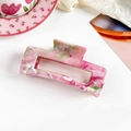 Detailed top view of a marble pink resin rectangle hair claw clip on a white background - Marble Flesh Pink