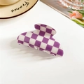 Detailed close-up of a purple and white checkered hair claw clip on a decorative plate - Square Toe / Purple and White Checkerboard