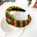 Detail of Christmas knot headband with festive red green and gold glitter stripes on a cup - Christmas Knot Headband - Wide Stripe Three Color