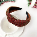 Close-up of red and green tinsel knotted headband displayed on a ceramic cup - Christmas Knot Headband - Thin Stripe Bicolor