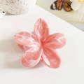 Detail of pink marble frangipani hair claw clip made of premium acetate material - 8.5cm Orange Pink Marble Flower