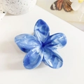 Detailed macro view of a blue marble-patterned frangipani flower hair claw clip - 8.5cm Sea Blue Marble Flower