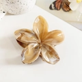 Detailed close-up of marble pattern plumeria hair claw clip in coffee and cream tones - 8.5cm Ginger Marble Flower