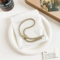Minimalist khaki elastic hair tie with gold textured metal bead in frosted zipper bag - Plastic/Resin / Basic Adjustable Hair Tie - Bronze Buckle Khaki