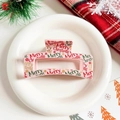 Detail of pink Christmas hair claw clip with Merry Christmas text on a festive tray - Pink Square - Merry Christmas