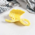Detail of yellow ginkgo leaf hair claw with marble texture on a modern desk - 11cm Ginkgo Leaf - Marble Bright Yellow