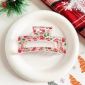Detail view of transparent Christmas hair claw with festive snowman and tree prints - Clear Square - Snowflake and Snowman