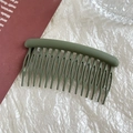 Detail of 15-tooth dark green matte hair comb on elegant aesthetic background - 9cm Matte Fruit Green