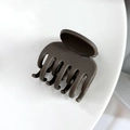 Detail view of large dark brown matte hair claw clip with cross-tooth design on white background - Dark Coffee