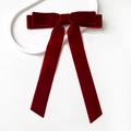Detail view of double-layered burgundy velvet bow hair clip with elegant long streamers - Wine Red (Tie Style)