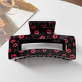 Close-up of black rectangular hair claw clip with red lip pattern on white background - Lip Style / Red Lips Rose (Black)