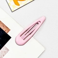 Detailed close-up of a smooth pink teardrop snap clip on a clean minimalist background - Alloy / Light Pink