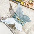 Detailed macro view of a 3D butterfly hair claw clip with blue marble texture - Marble Grey-Green (7.5cm Butterfly)