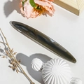 Close-up of long grey marble textured spring hair clip on white textured background - 11.5cm Long Oval / Jelly Dark Gray