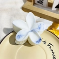 Frangipani hair claw clip with blue marble ink texture for elegant updos - White Blue Ink Style