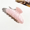 Detailed macro view of pink marble patterned hair claw with smooth acetate finish - Marble Pink (9cm Square)