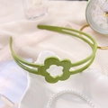 Serre-tête fleur évidé vert herbe pour filles avec dents antidérapantes pour la coiffure - Fleur Brillante Verte