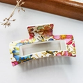Rectangular white hair claw clip featuring colorful tropical floral prints with gold edges - Large Floral White Base