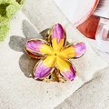 Macro shot of purple enamel frangipani flower hair claw clip with golden metal base - 3cm Purple Yellow Heart Frangipani Metal Claw